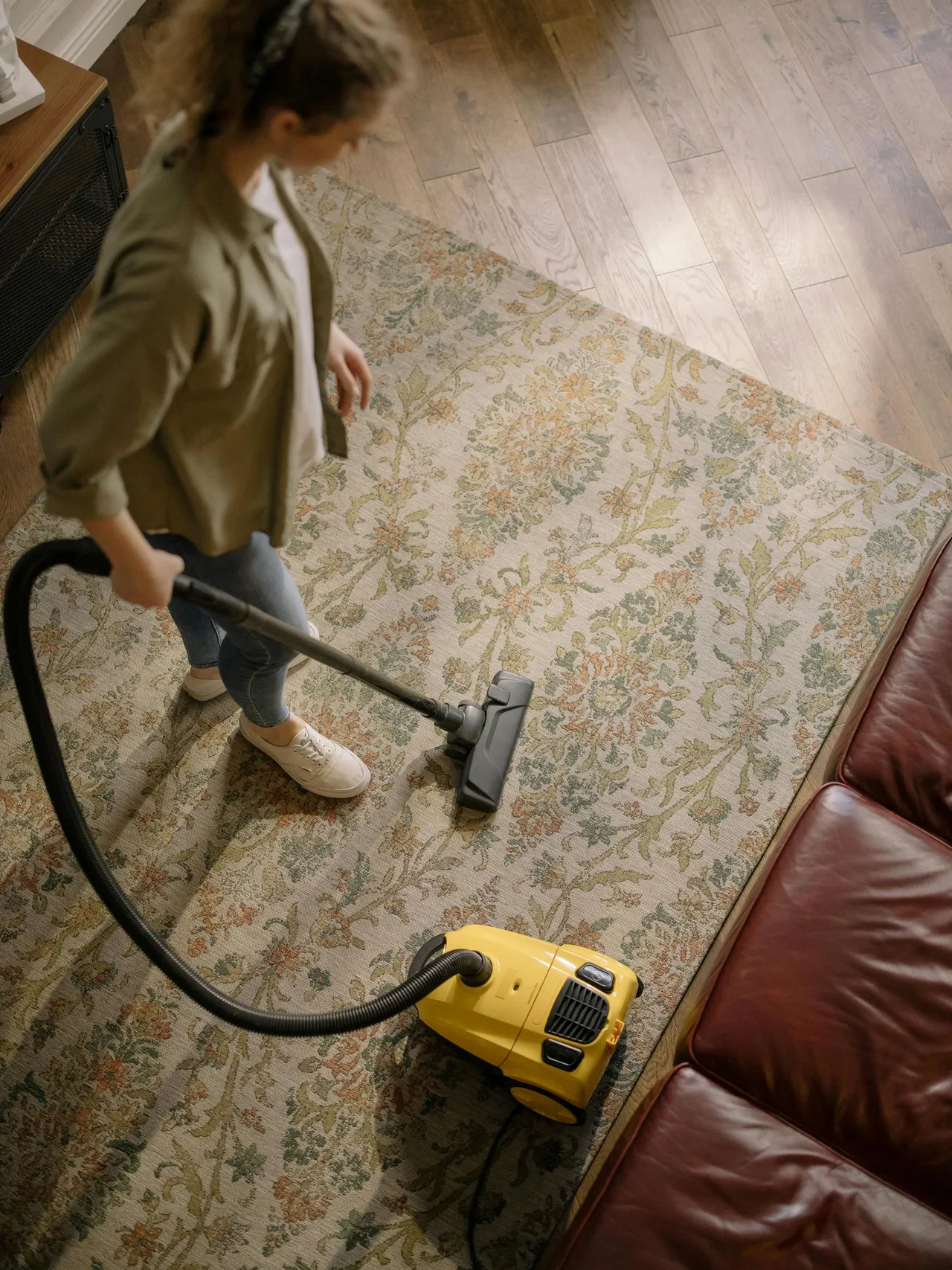 Cleaning a Carpet with Vacuum Cleaner