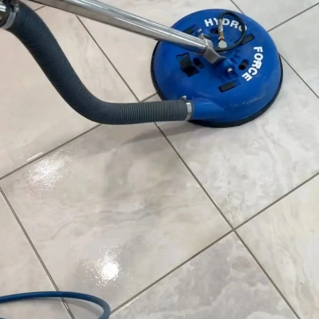 Hot water extraction tool deep cleaning tile and grout lines in a Saskatoon home Hot water extraction tool deep cleaning tile and grout lines in a Saskatoon home